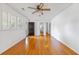 Open living room featuring hardwood floors, neutral paint, and lots of natural light at 112 Roselle Ave, Goose Creek, SC 29445