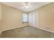 A bright carpeted bedroom features a window, a closet, and neutral paint at 113 Jackson Rd, Ladson, SC 29456