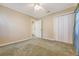 A carpeted bedroom features two large closets, a ceiling fan, and neutral paint colors at 113 Jackson Rd, Ladson, SC 29456
