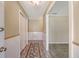 Inviting hallway with wood-look floors, leading to carpeted living spaces at 113 Jackson Rd, Ladson, SC 29456