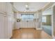 Eat-in kitchen with white cabinets, a ceiling fan, and natural light at 113 Jackson Rd, Ladson, SC 29456