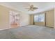 Spacious living room with window views and access to the adjoining kitchen area at 113 Jackson Rd, Ladson, SC 29456