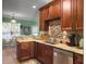 Well-equipped kitchen with granite countertops and stainless steel appliances at 1213 Grasswind Dr, Hanahan, SC 29410