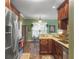 Modern kitchen with updated countertops and stainless steel appliances, breakfast area visible at 1213 Grasswind Dr, Hanahan, SC 29410