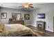 Inviting main bedroom featuring a fireplace, dresser, TV, and soothing decor at 1213 Grasswind Dr, Hanahan, SC 29410