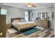 Cozy main bedroom with natural light, stylish furniture, and neutral decor for a peaceful retreat at 1213 Grasswind Dr, Hanahan, SC 29410