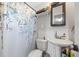 Neat bathroom with pedestal sink, medicine cabinet, and decorative shower curtain at 124 Englewood Rd, Goose Creek, SC 29445