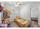 Bright bedroom featuring a toddler bed, toy storage, and a window for natural light at 124 Englewood Rd, Goose Creek, SC 29445