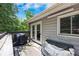 Exterior shot of the deck featuring outdoor grill and furniture, ideal for relaxing or entertaining at 124 Englewood Rd, Goose Creek, SC 29445