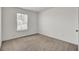 Carpeted bedroom with window bringing in natural light at 138 Sweet Cherry Ln, Summerville, SC 29486