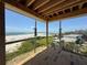 Ocean view from the exposed rafters and beams of a home being constructed on the beach at 2879 Marshall Blvd, Sullivans Island, SC 29482