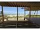 View of the beach and ocean from an unfinished room of a beach house under construction at 2879 Marshall Blvd, Sullivans Island, SC 29482