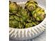 Close up of artichokes in a white bowl with decorative spikes around the top at 2911 Old Tavern Ct, Mount Pleasant, SC 29466
