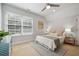 Well-lit bedroom with ample natural light and classic decor featuring a stylish area rug at 2911 Old Tavern Ct, Mount Pleasant, SC 29466