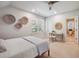 Bedroom with carpet, ceiling fan, a desk, and a connecting bathroom at 2911 Old Tavern Ct, Mount Pleasant, SC 29466