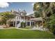 Charming home with a spacious yard, pergola covered patio, and inviting porch at 2911 Old Tavern Ct, Mount Pleasant, SC 29466