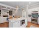 Open-concept kitchen island with stainless steel oven and white marble countertops at 2911 Old Tavern Ct, Mount Pleasant, SC 29466