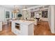 Spacious kitchen features island with seating, stainless appliances, hardwood floors, and modern décor at 2911 Old Tavern Ct, Mount Pleasant, SC 29466