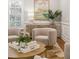 Close up of the living room featuring designer chairs, a round coffee table, and elegant decor at 2911 Old Tavern Ct, Mount Pleasant, SC 29466