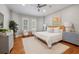 Bright bedroom with hardwood floors, neutral tones, and stylish furnishings at 2911 Old Tavern Ct, Mount Pleasant, SC 29466