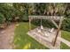 Inviting backyard features a firepit with pergola and seating for outdoor relaxation at 2911 Old Tavern Ct, Mount Pleasant, SC 29466