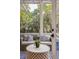 Covered porch with comfortable seating at 2911 Old Tavern Ct, Mount Pleasant, SC 29466