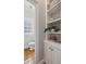 Charming powder room with classic finishes and stylish built-in shelving at 2911 Old Tavern Ct, Mount Pleasant, SC 29466
