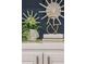 Close up of decorative items on shelving with white cabinets at 2911 Old Tavern Ct, Mount Pleasant, SC 29466