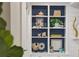 Shelving featuring decorative elements, books, and art at 2911 Old Tavern Ct, Mount Pleasant, SC 29466