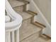 Detailed close-up of a white railing of a carpeted staircase, showing quality craftsmanship at 2911 Old Tavern Ct, Mount Pleasant, SC 29466