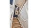 Inviting staircase with carpet steps, white railings, wooden accents, and stylish decor at 2911 Old Tavern Ct, Mount Pleasant, SC 29466