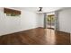 Bedroom with hardwood floors and access to a private outdoor space at 3 Sand Dollar Dr, Isle of Palms, SC 29451