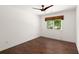 Bright bedroom features a ceiling fan and a window with a woven shade at 3 Sand Dollar Dr, Isle of Palms, SC 29451