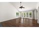 Spacious living area with hardwood floors and large windows, perfect for relaxation at 3 Sand Dollar Dr, Isle of Palms, SC 29451