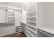 Spacious walk-in closet with custom shelving and ample storage at 3 Sand Dollar Dr, Isle of Palms, SC 29451