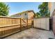 Backyard with small shed, wooden fence, and a view of the back of the house at 415 Parkdale Drive # E-8, Charleston, SC 29414