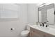 Modern bathroom features an updated vanity, mirror, and fixtures at 415 Parkdale Drive # E-8, Charleston, SC 29414