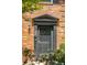 Charming brick house entrance with decorative door and hardware at 415 Parkdale Drive # E-8, Charleston, SC 29414