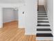 Inviting foyer with an open floorplan and staircase to the second level at 415 Parkdale Drive # E-8, Charleston, SC 29414