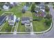 Aerial view of a house with a manicured lawn in a quiet neighborhood setting at 4847 Cane Pole Ln, Summerville, SC 29485