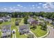 Beautiful home featuring backyard pond views and lush neighborhood landscaping, seen from above at 4847 Cane Pole Ln, Summerville, SC 29485