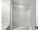 Clean bathroom featuring a bright white shower and tub combination with modern fixtures at 4847 Cane Pole Ln, Summerville, SC 29485