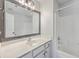 Clean bathroom featuring a white vanity, framed mirror, and a shower/tub combination at 4847 Cane Pole Ln, Summerville, SC 29485