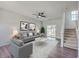 Bright living room with neutral walls, modern furniture, and access to a patio at 4847 Cane Pole Ln, Summerville, SC 29485