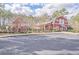 A large barn-themed community playground and clubhouse are complemented by ample parking at 4847 Cane Pole Ln, Summerville, SC 29485