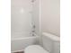 Modern bathroom featuring a tub-shower combo, tile and a toilet at 5005 Ferry Field Dr, Summerville, SC 29485