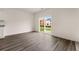 Bright dining area with hardwood floors and sliding glass doors at 5005 Ferry Field Dr, Summerville, SC 29485