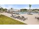 Community pool with plentiful lounge chairs and seating areas at 5005 Ferry Field Dr, Summerville, SC 29485