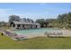 Large community pool with lounge chairs, a covered pavilion and mature trees nearby at 545 Wayton Cir, Moncks Corner, SC 29461