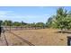 Community dog park with fenced perimeter and wood chip ground cover for a safe, clean environment at 545 Wayton Cir, Moncks Corner, SC 29461